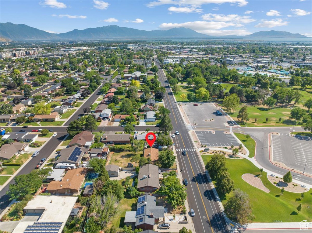 Birds eye view of property with a mountain view