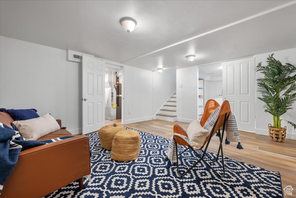 Living room featuring light hardwood / wood-style flooring