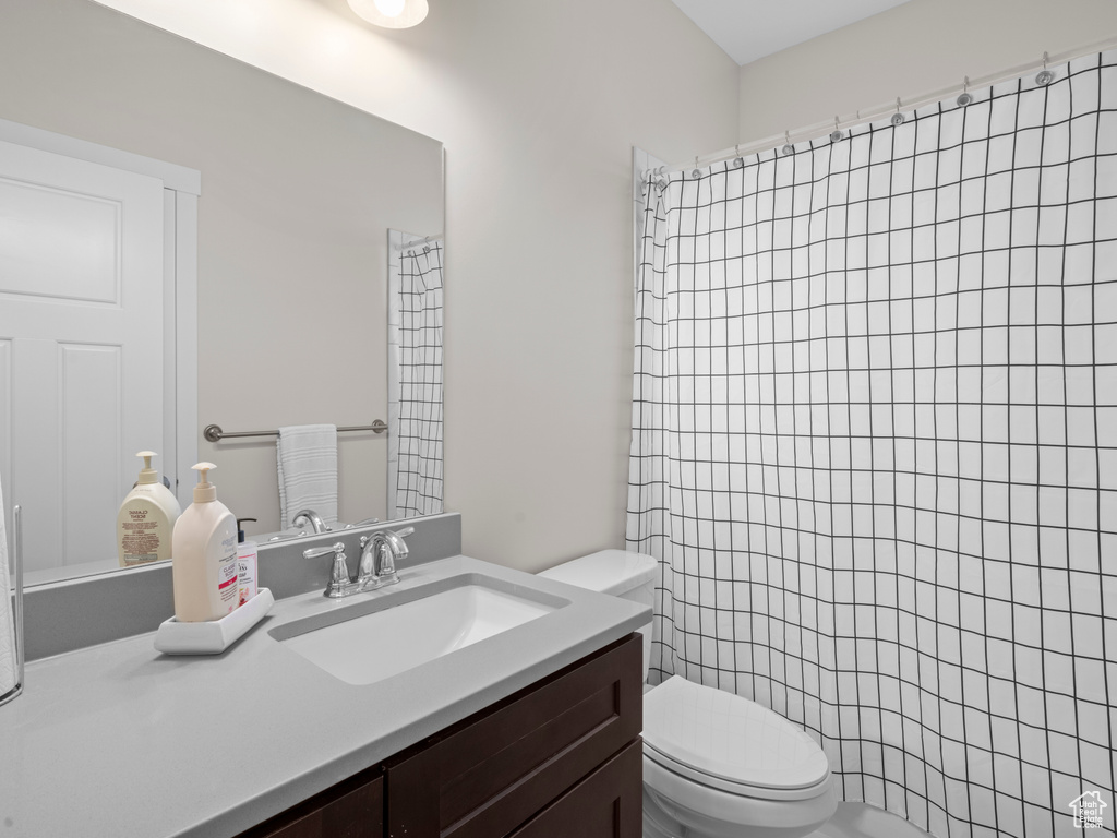 Bathroom with vanity and toilet