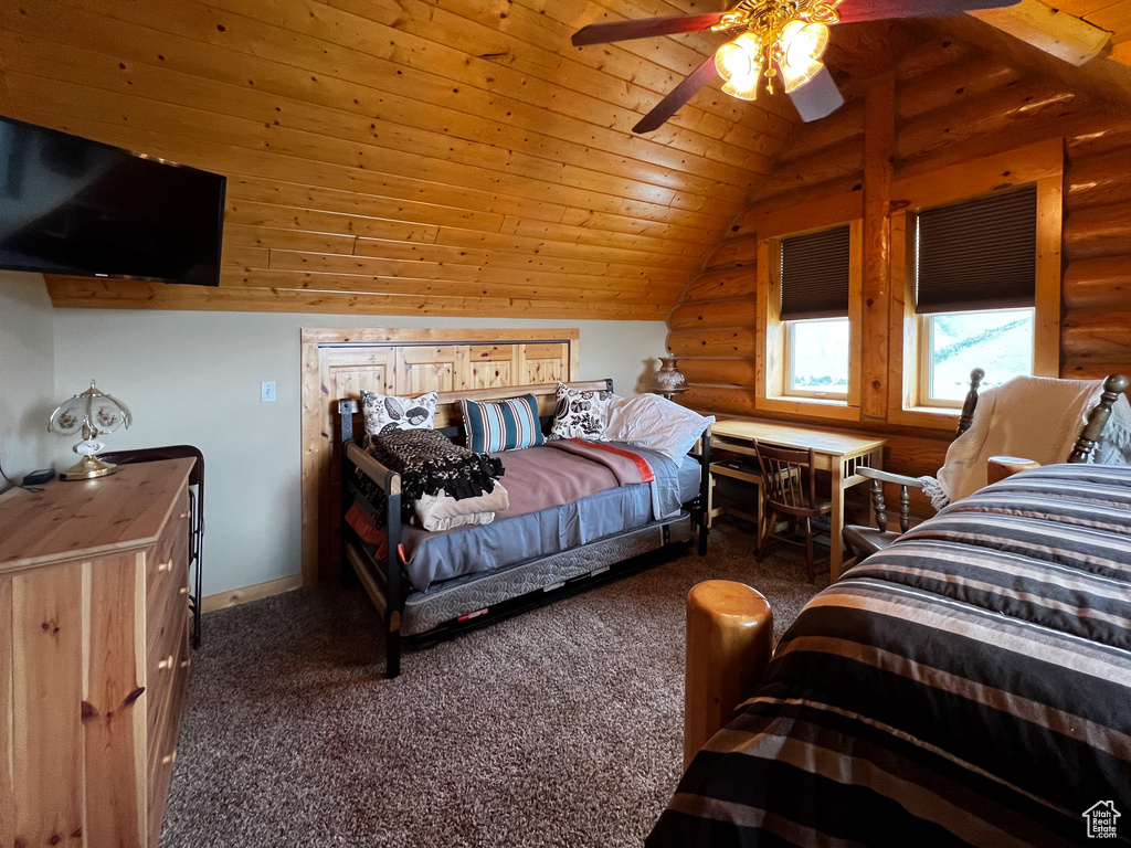 Carpeted bedroom featuring ceiling fan, lofted ceiling, log walls, and wooden ceiling