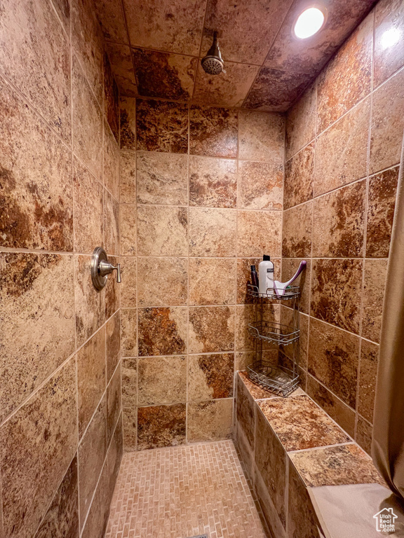 Bathroom with tiled shower