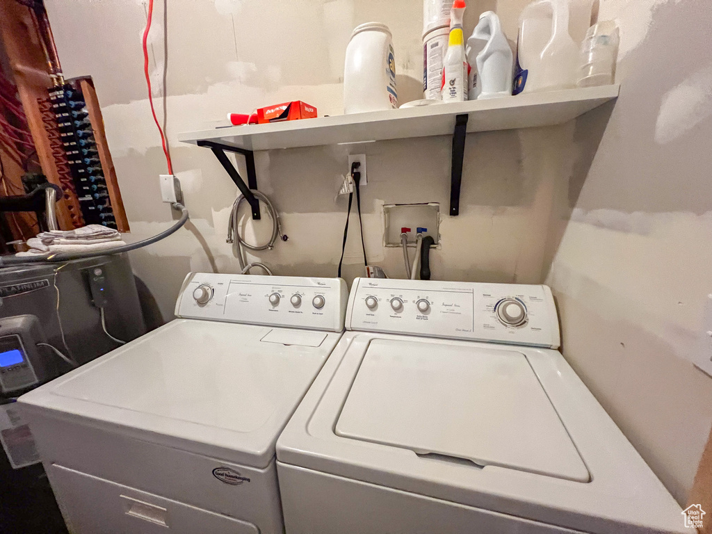 Laundry area featuring washer and clothes dryer