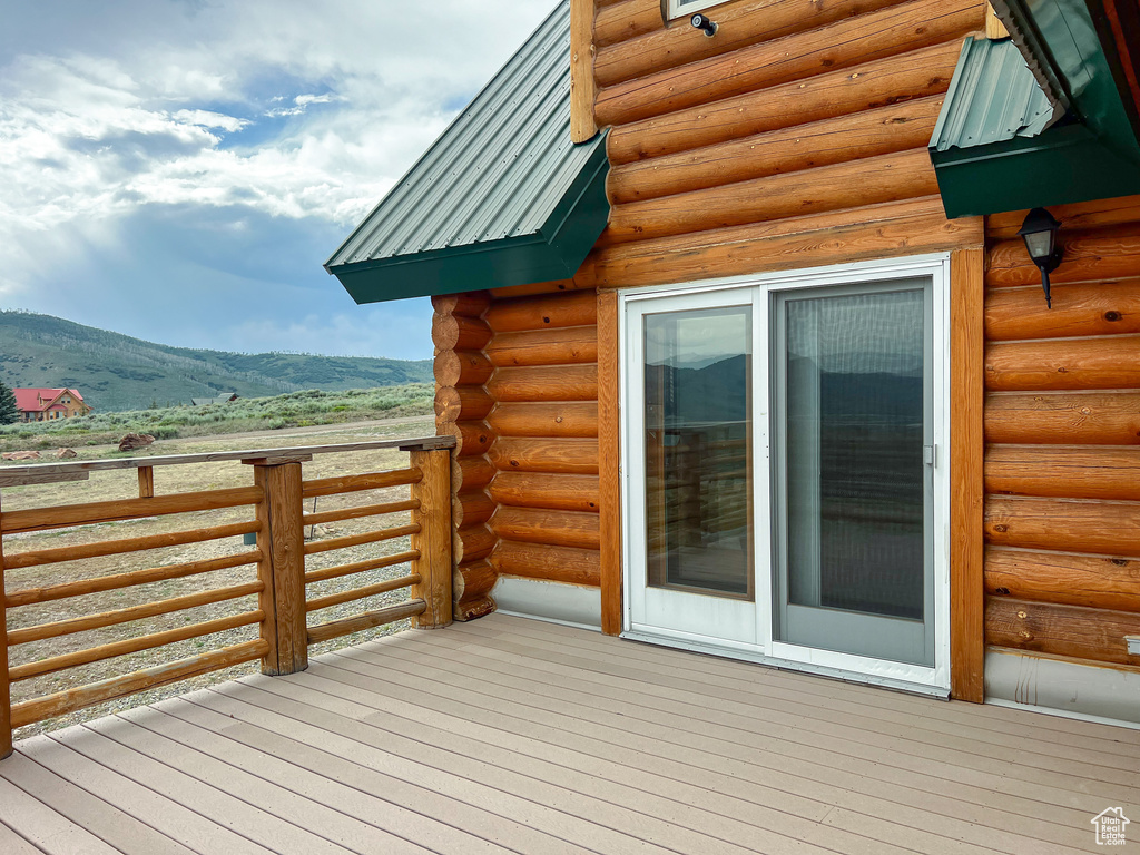 Wooden terrace with a mountain view