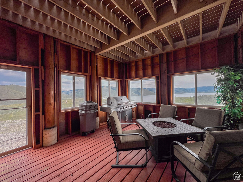 Sunroom with a mountain view