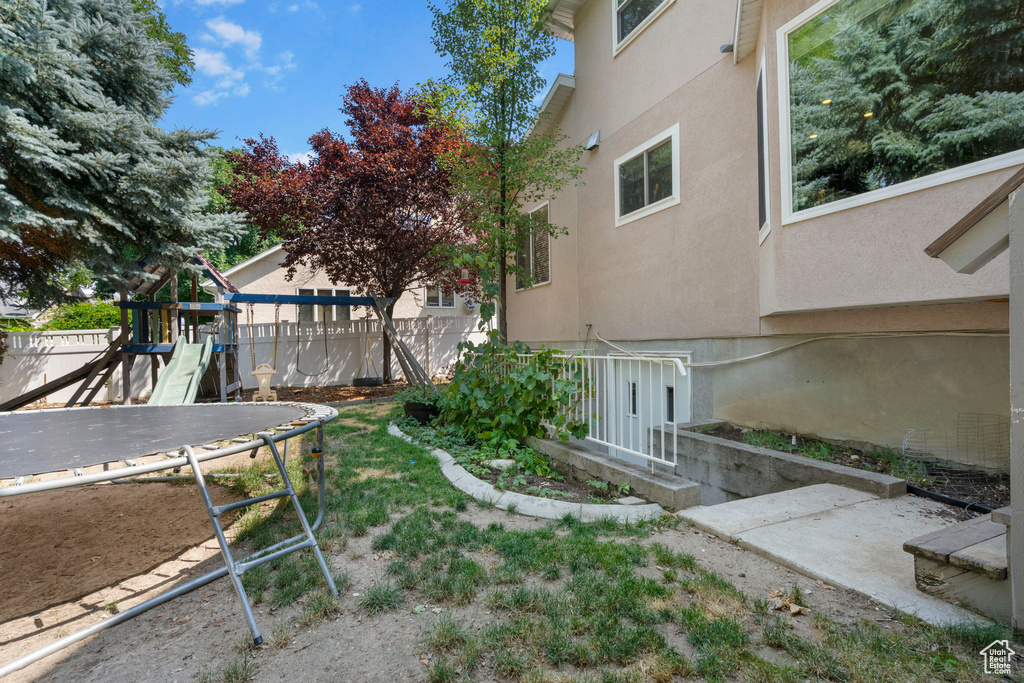 View of yard with a playground