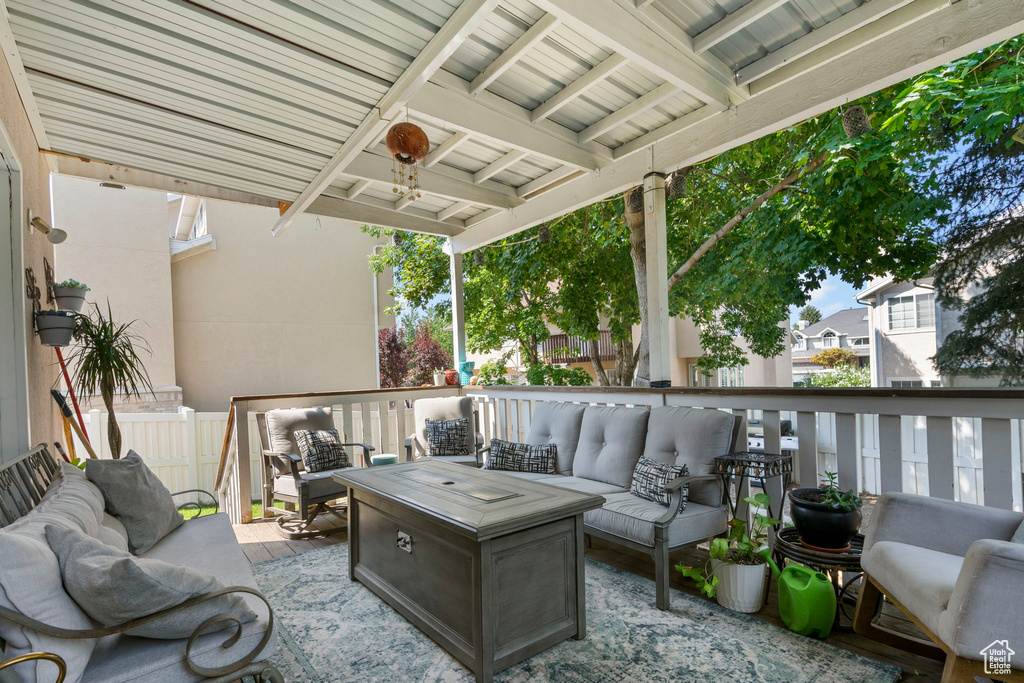 Exterior space with an outdoor living space with a fire pit