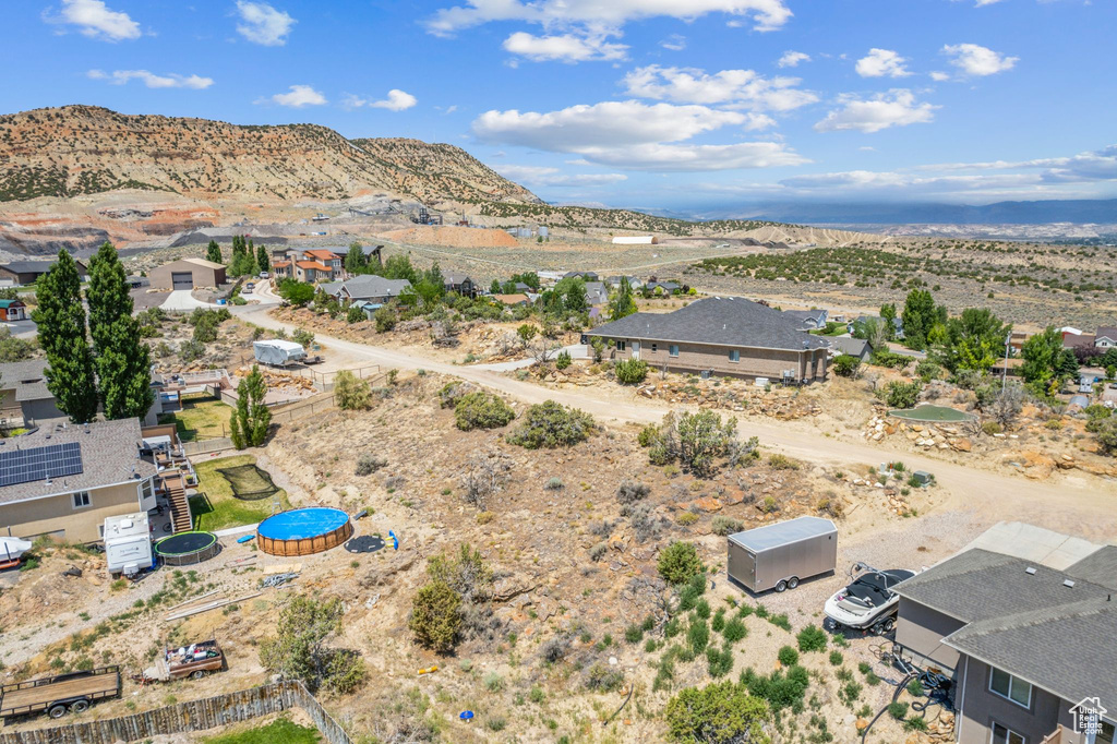 Birds eye view of property featuring a mountain view