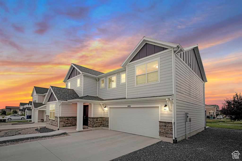 View of front of home featuring a garage