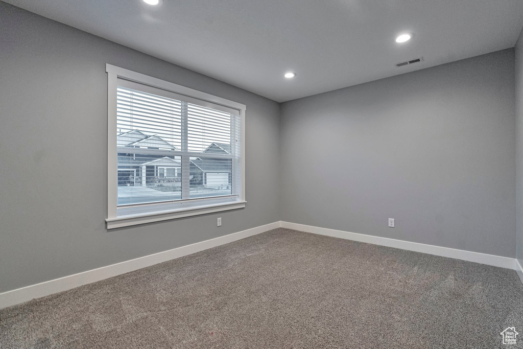 View of carpeted spare room