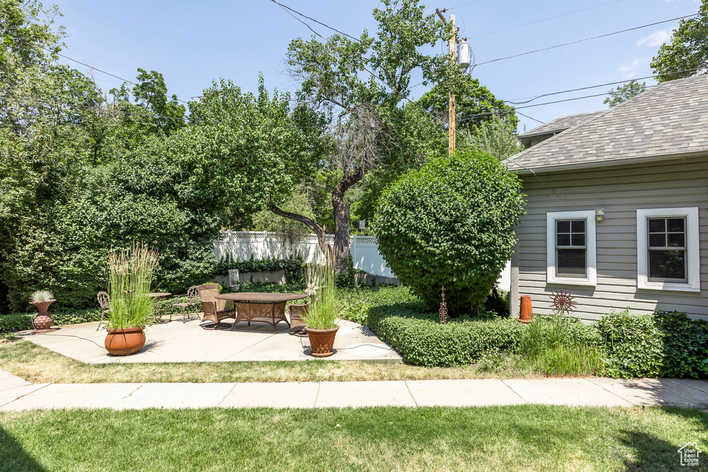 View of yard with a patio area