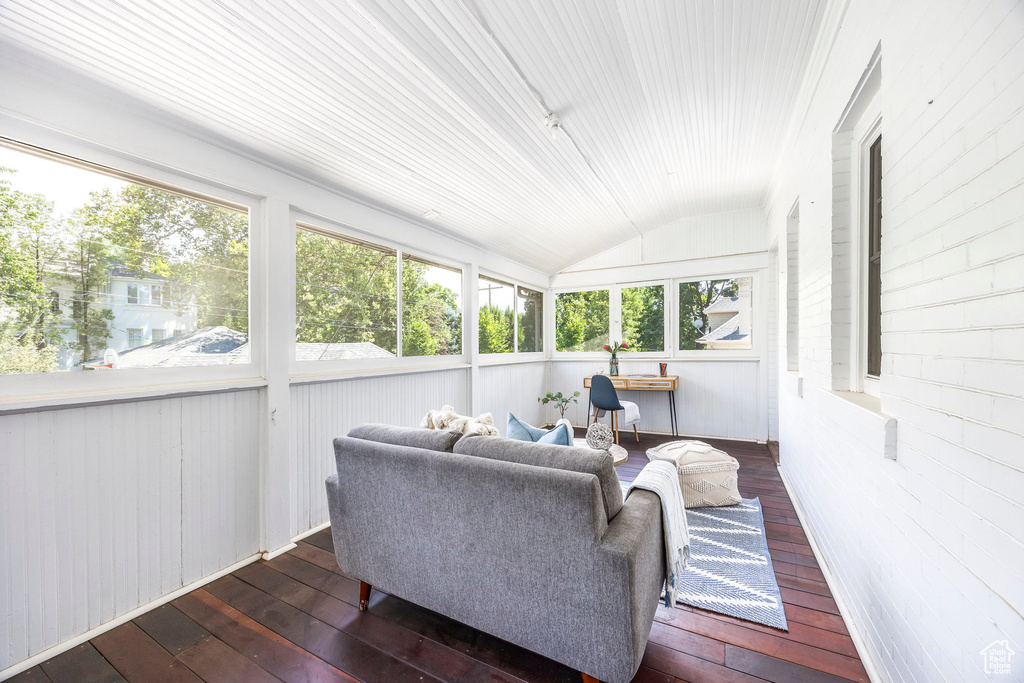 Sunroom / solarium with vaulted ceiling and a wealth of natural light