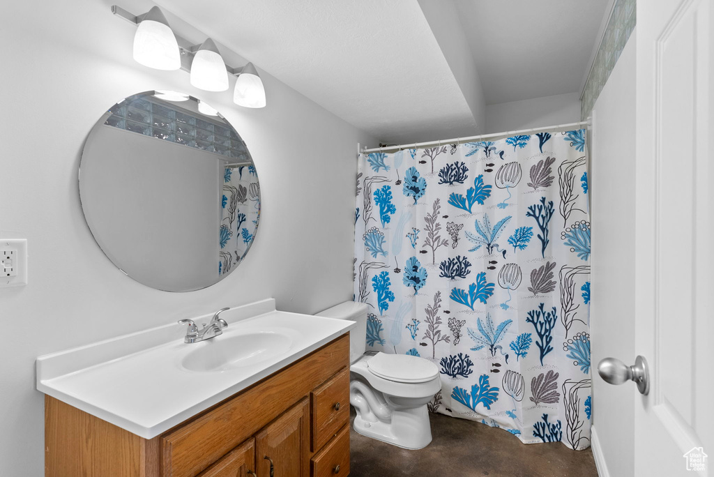 Bathroom featuring toilet and vanity