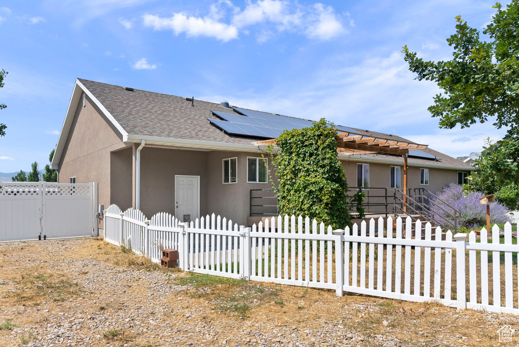 View of front of home with solar panels