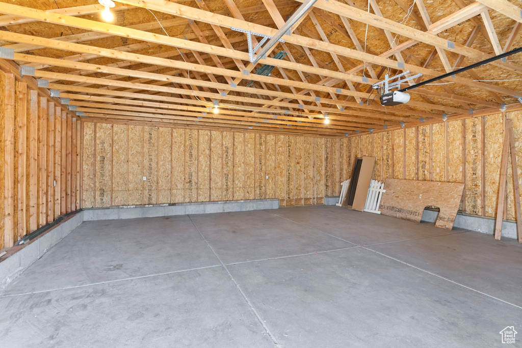 Garage featuring a garage door opener