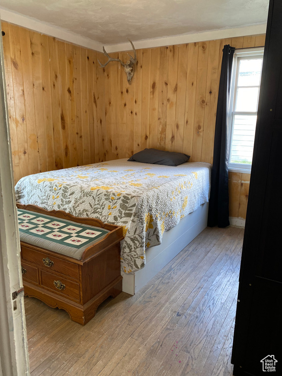 Bedroom featuring hardwood / wood-style floors