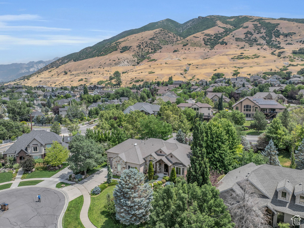 Birds eye view of property with a mountain view