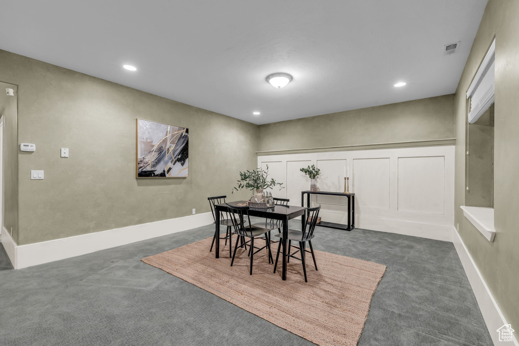 View of carpeted dining room