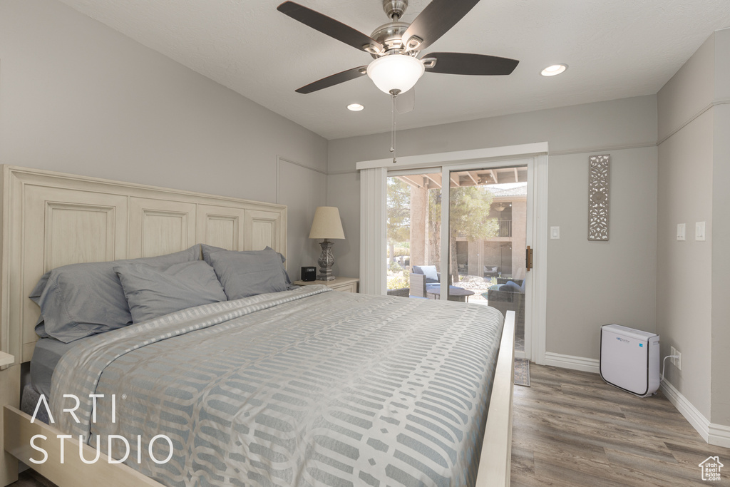 Bedroom featuring access to outside, ceiling fan, and wood-type flooring