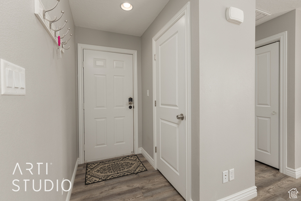 Interior space with hardwood / wood-style floors