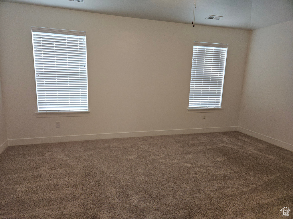 Empty room featuring carpet