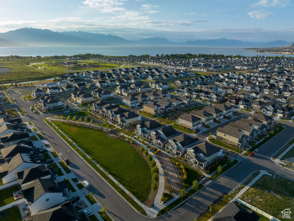 Birds eye view of property with a mountain view