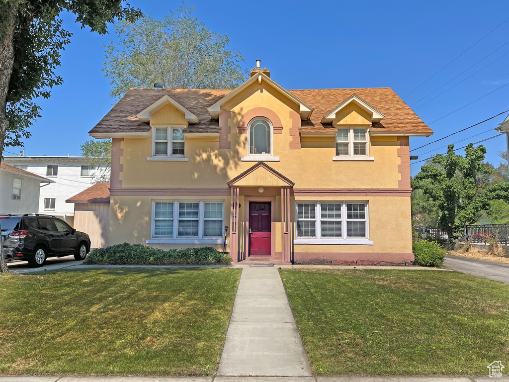 View of front of home with a front yard