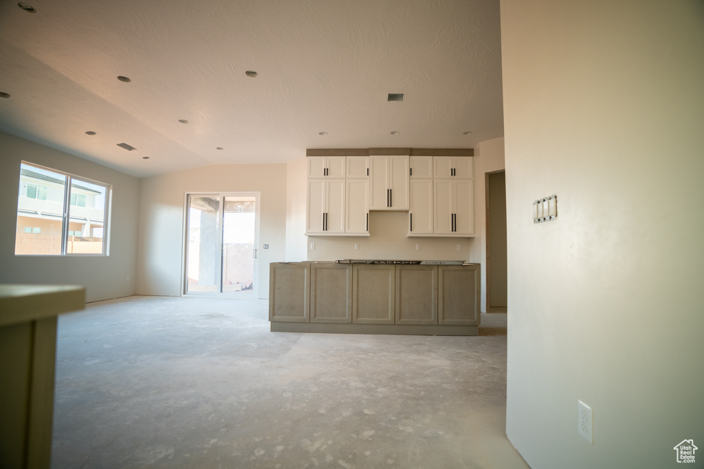 Kitchen featuring white cabinetry