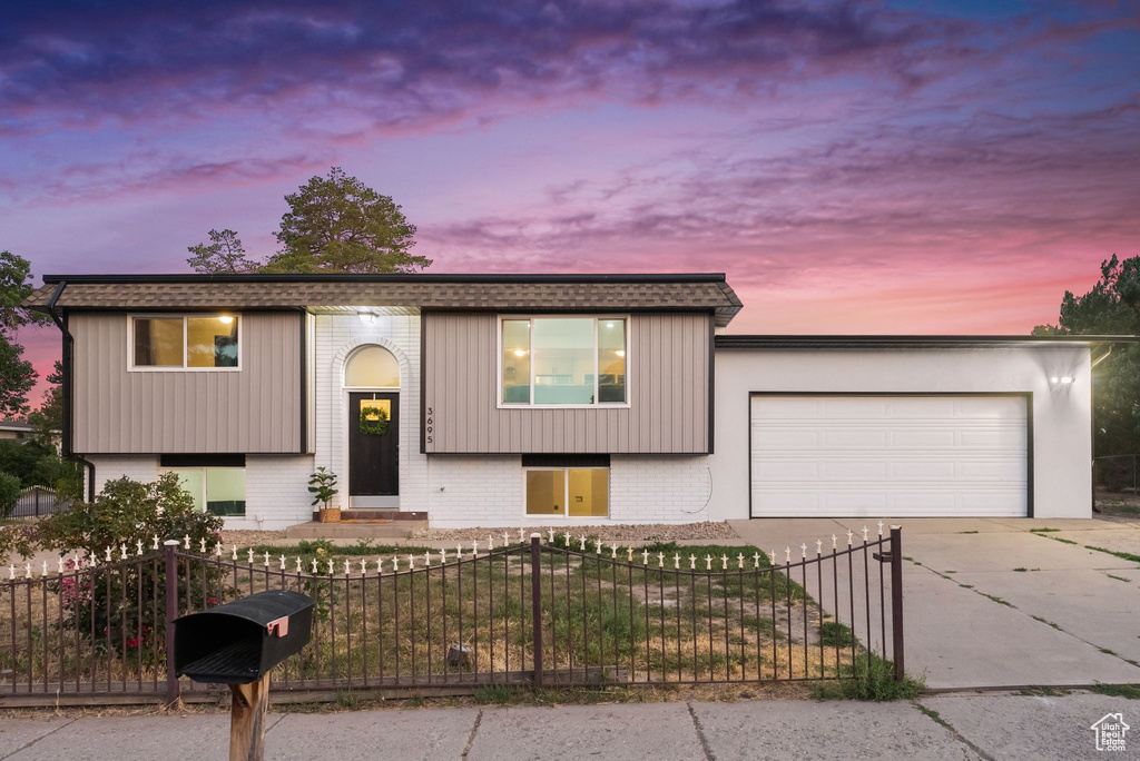 View of front of house with a garage