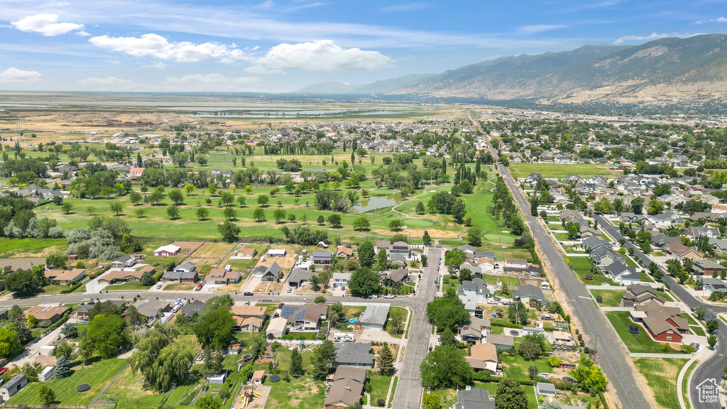 Birds eye view of property with a mountain view