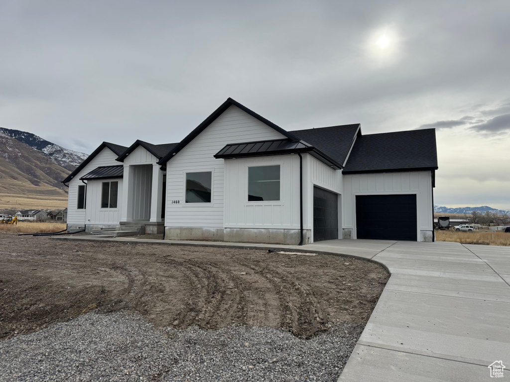 Modern farmhouse style home with a mountain view