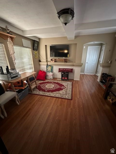 Living room with hardwood / wood-style floors