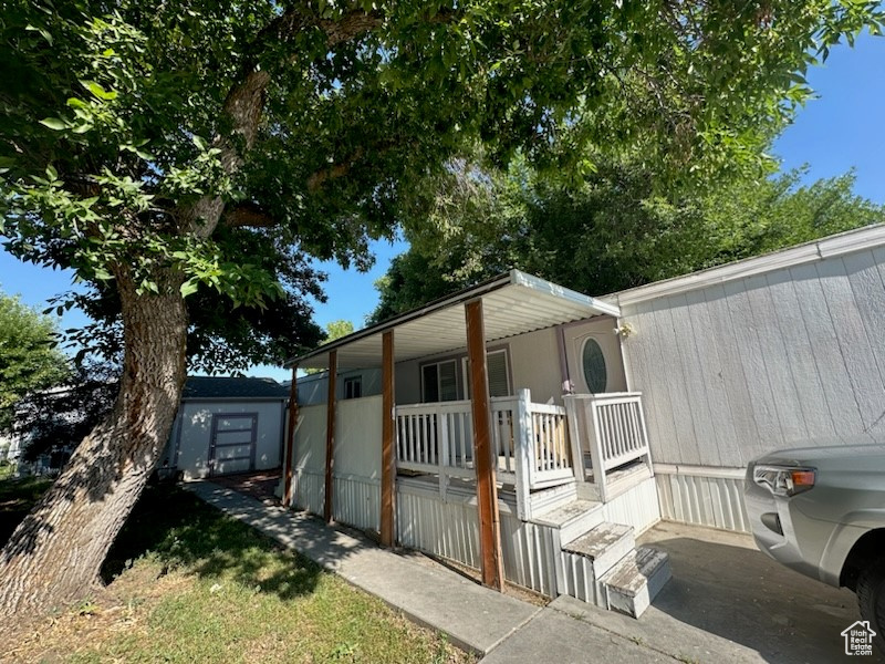 View of front of home featuring covered porch