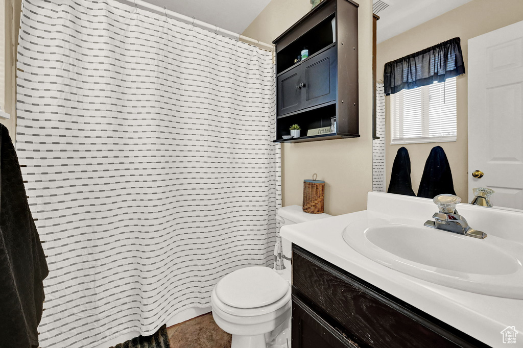 Bathroom with vanity and toilet