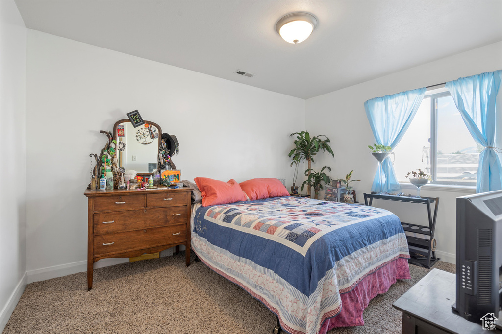 View of carpeted bedroom