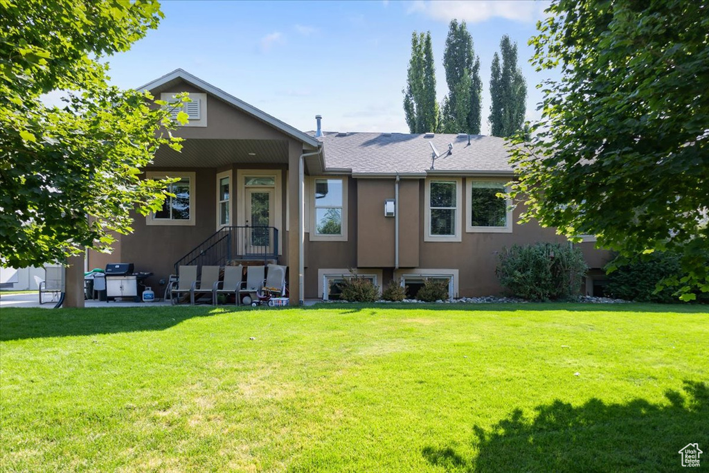 View of front of home with a front lawn