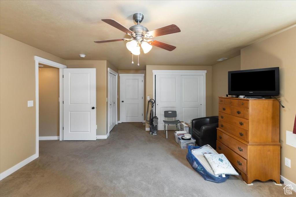 Interior space featuring ceiling fan