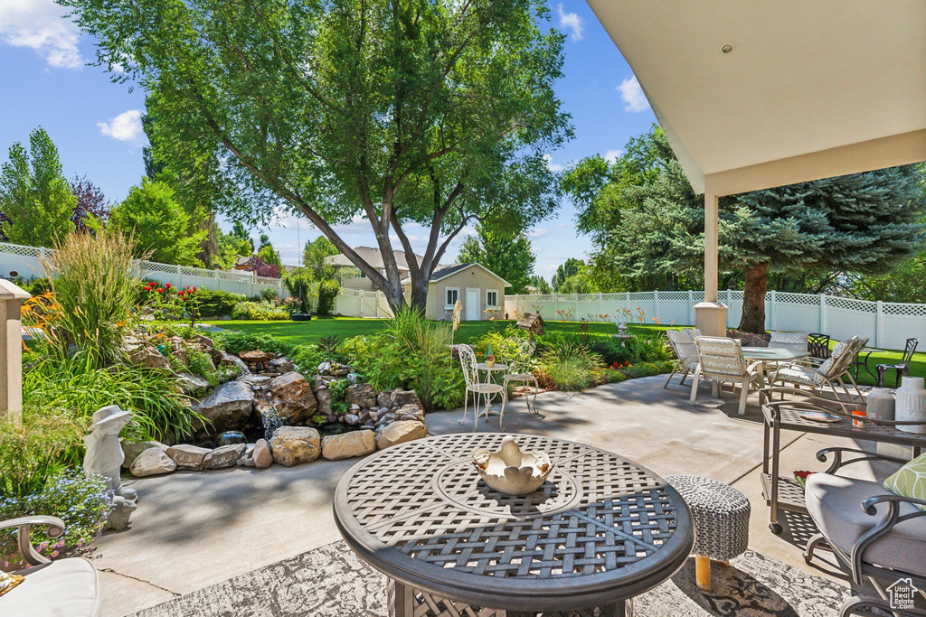 View of patio / terrace with a storage unit