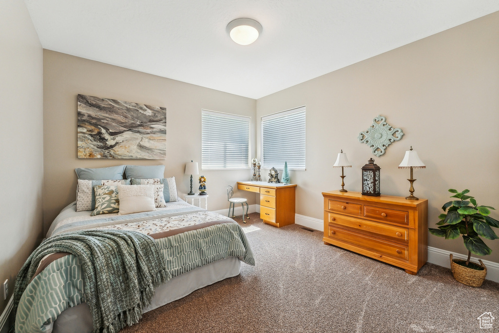 Bedroom featuring carpet flooring