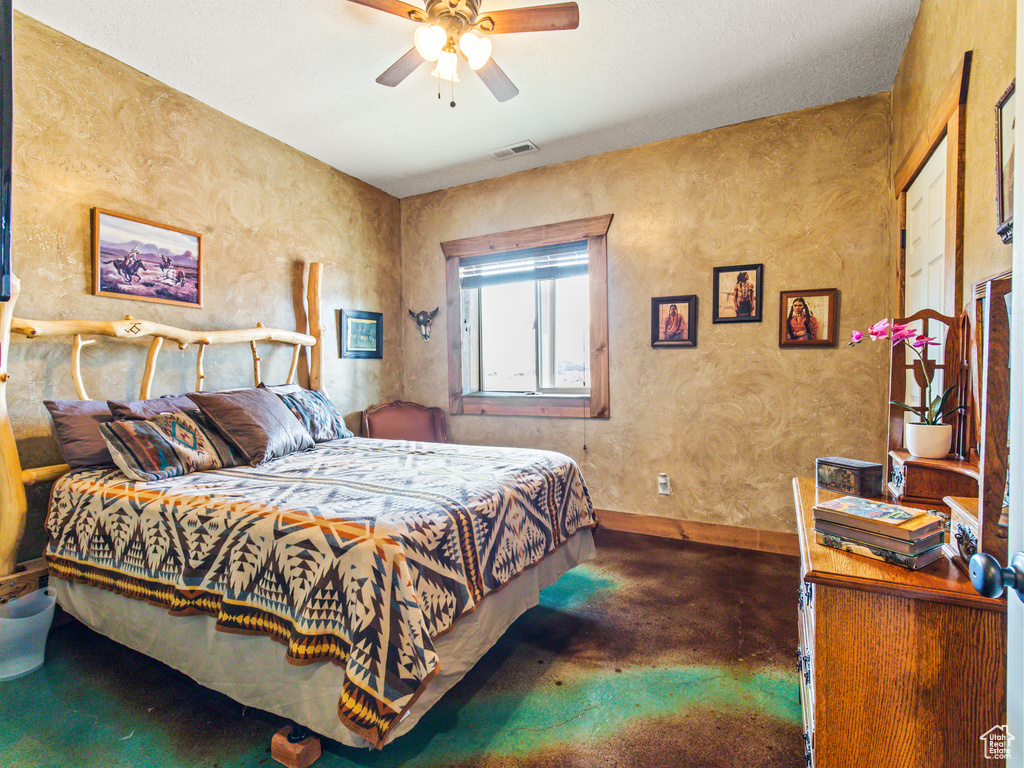 Bedroom featuring ceiling fan