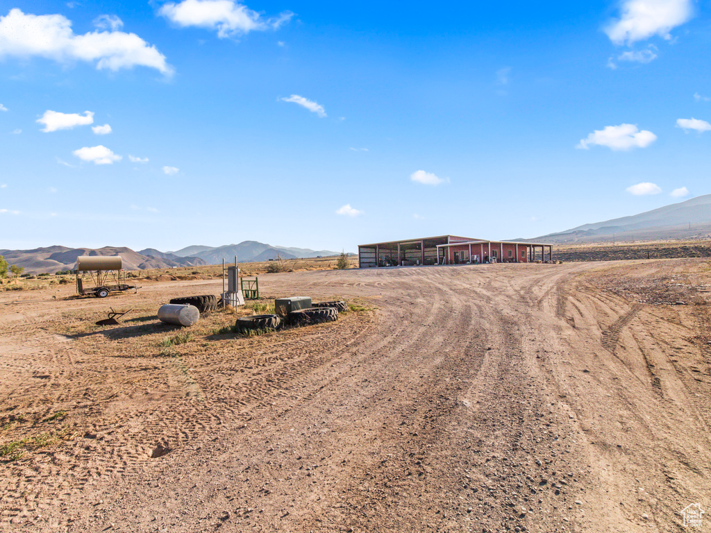 View of street with a mountain view and a rural view