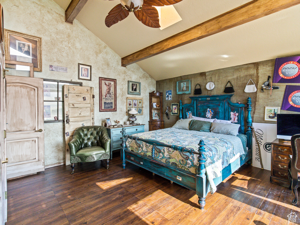 Bedroom with wood-type flooring, lofted ceiling with beams, and ceiling fan