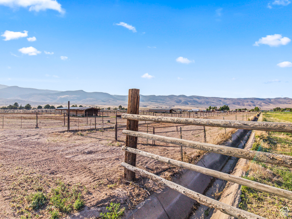 View of yard featuring a mountain view and a rural view