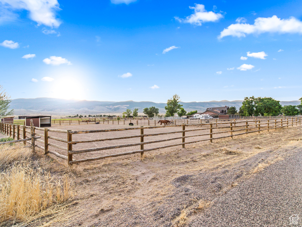 View of yard featuring a mountain view and a rural view