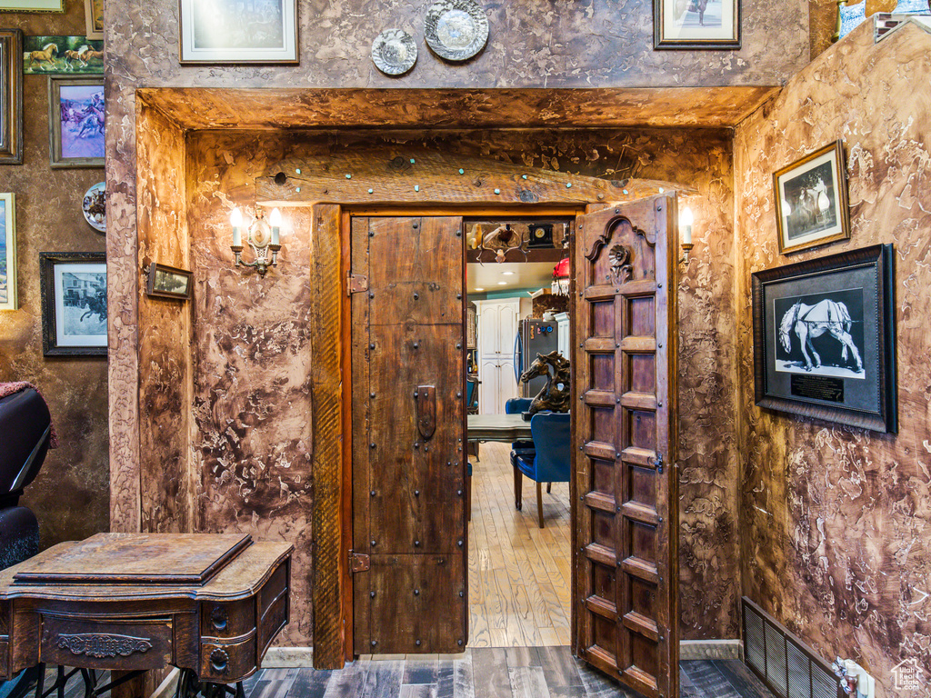 Bathroom with hardwood / wood-style flooring