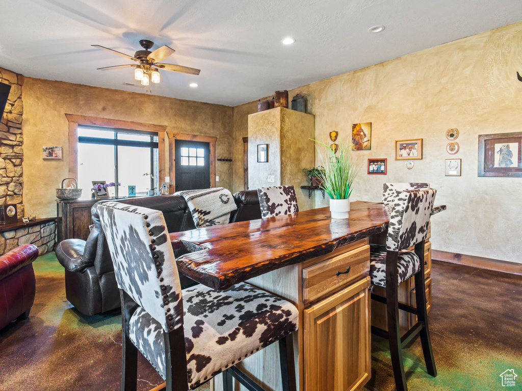 Interior space featuring butcher block counters and ceiling fan