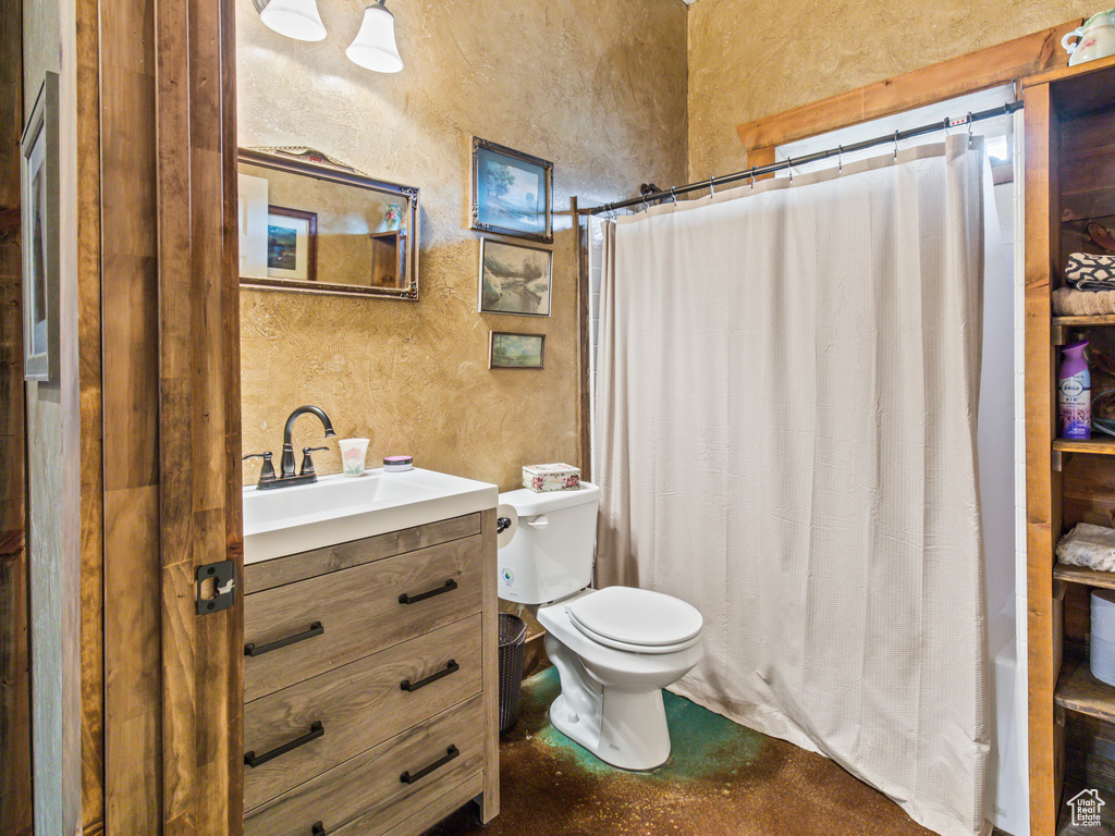 Bathroom with vanity and toilet