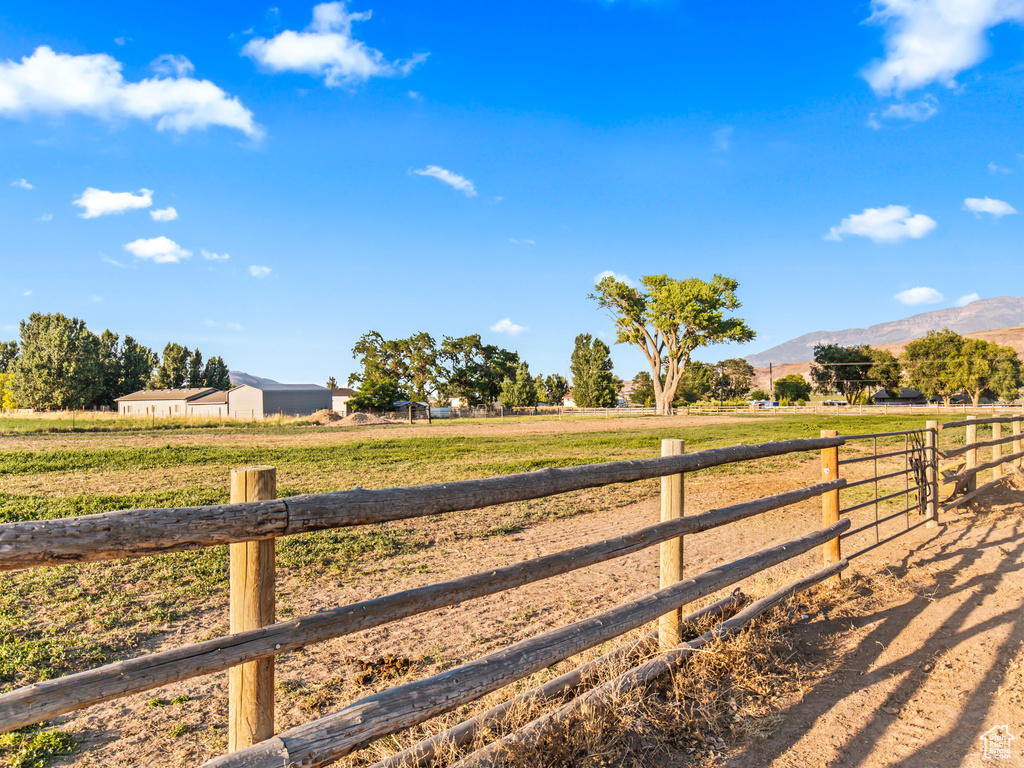 View of yard featuring a mountain view and a rural view