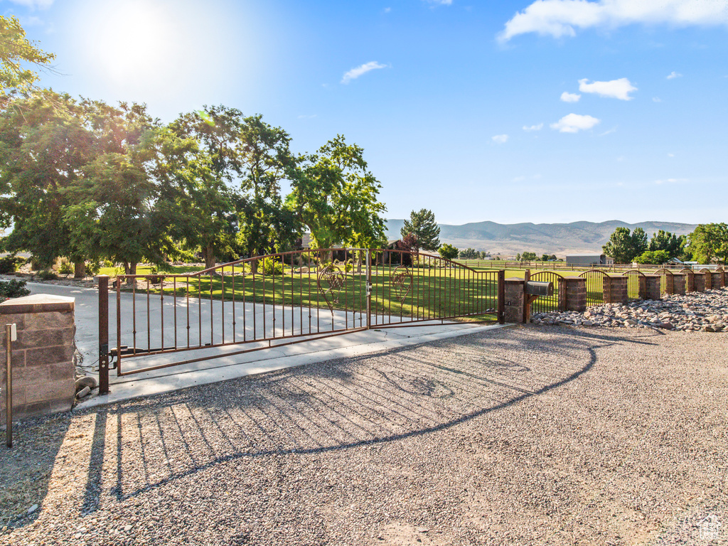 View of gate with a mountain view