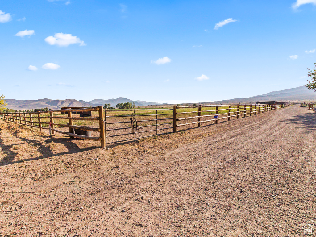 View of yard featuring a mountain view and a rural view