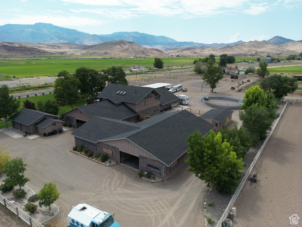 Birds eye view of property with a mountain view